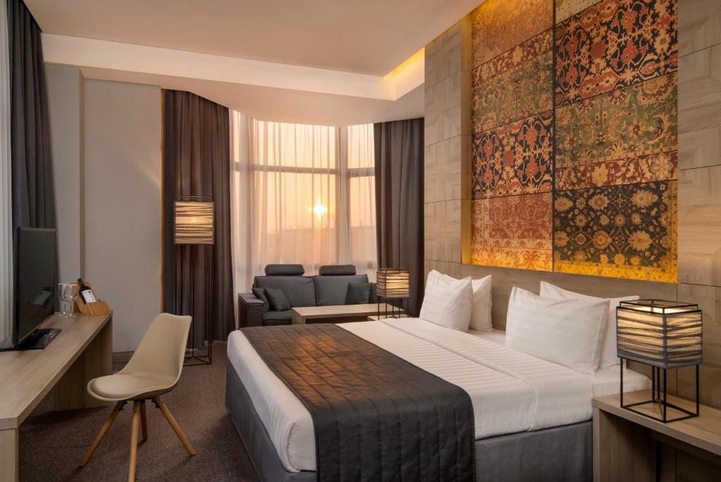 Postel nebo postele na pokoji v ubytování Republica Hotel Yerevan