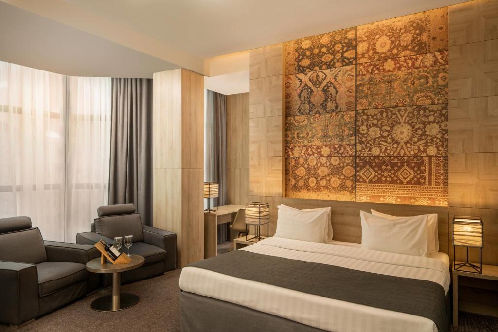 Postel nebo postele na pokoji v ubytování Republica Hotel Yerevan