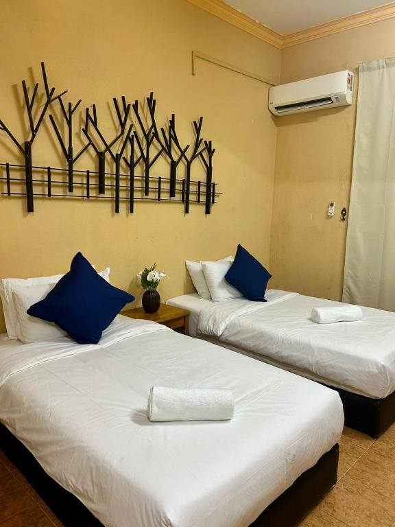 Postel nebo postele na pokoji v ubytování Rhu Dormitory