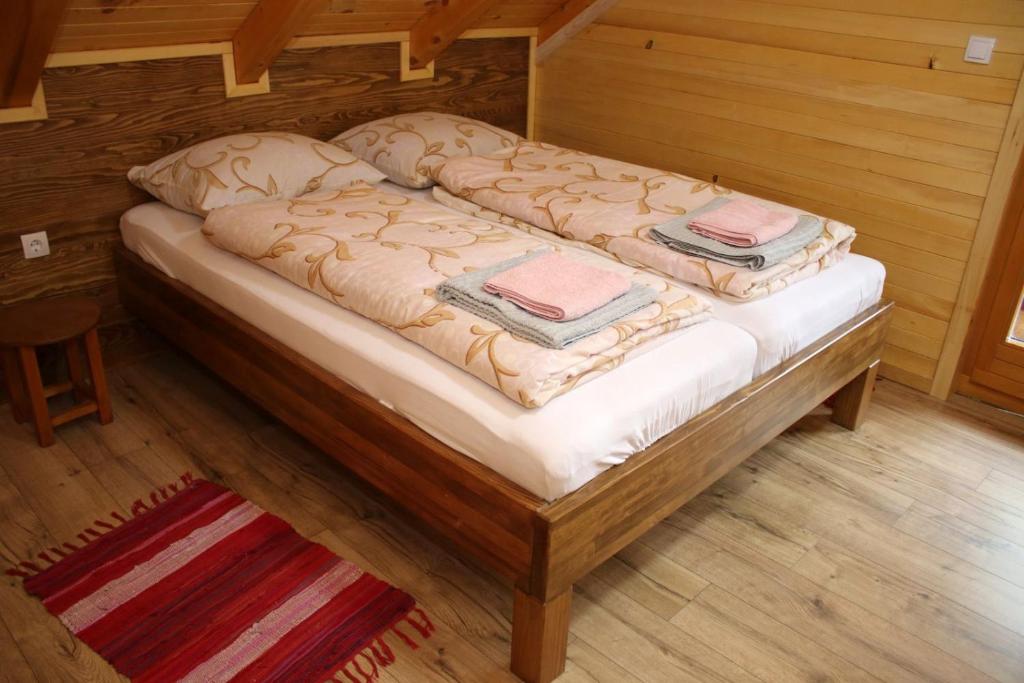 Postel nebo postele na pokoji v ubytování Eko kuca Jandro