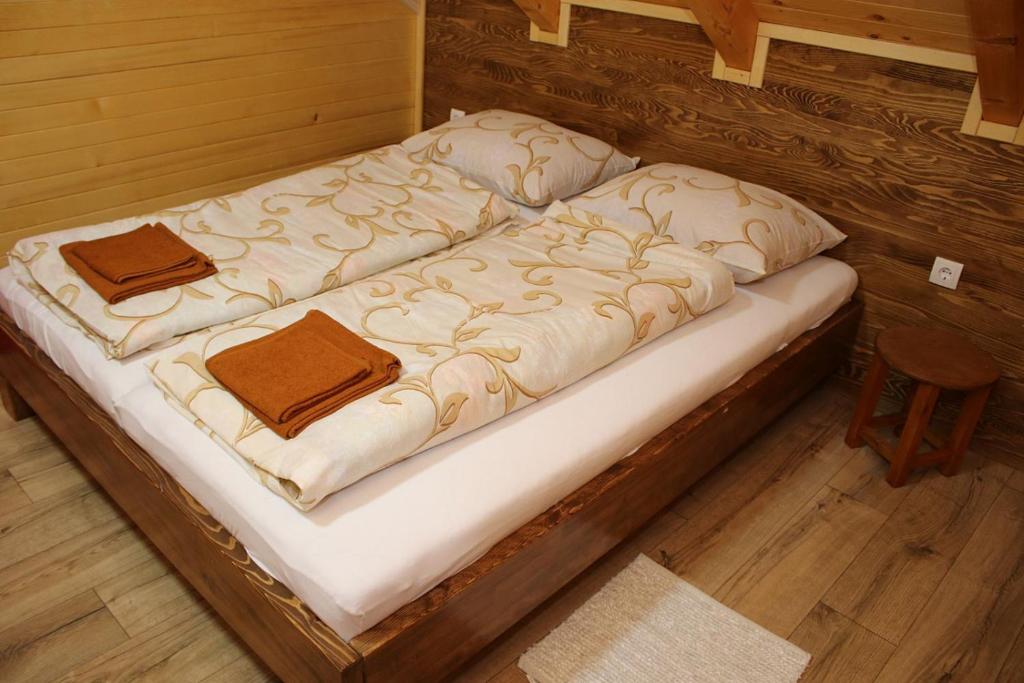 Postel nebo postele na pokoji v ubytování Eko kuca Jandro