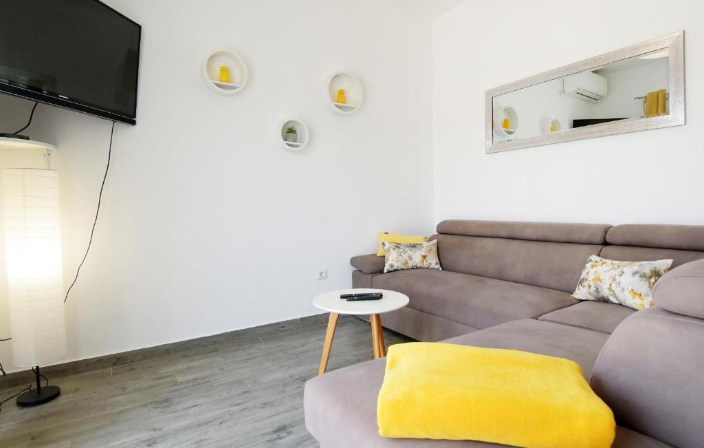 Telewizja i/lub zestaw kina domowego w obiekcie Apartman Paštura