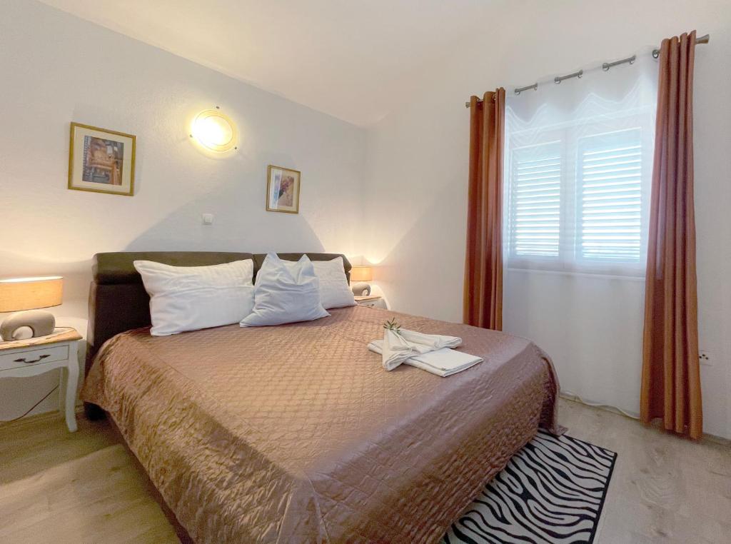 Postel nebo postele na pokoji v ubytování Apartment Villa Slavija