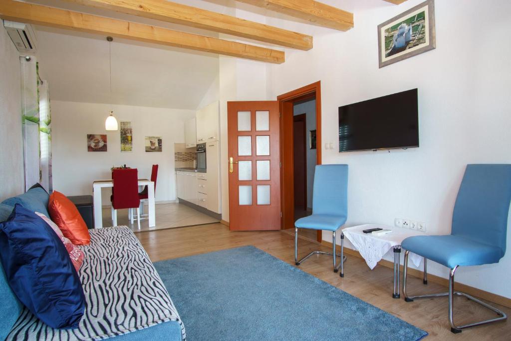 TV a/nebo společenská místnost v ubytování Apartment Villa Slavija