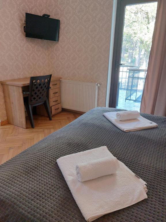 Llit o llits en una habitació de Eco Oasis