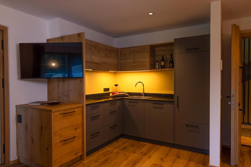 Kuchyň nebo kuchyňský kout v ubytování Linhea Apartments
