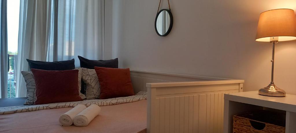 Łóżko lub łóżka w pokoju w obiekcie AnJa Apartment