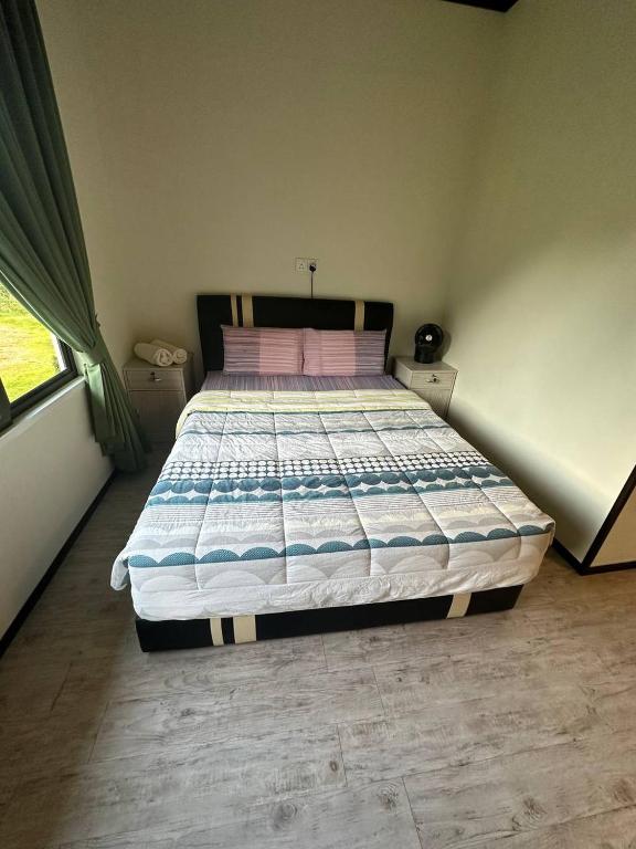 Postel nebo postele na pokoji v ubytování GEORGE ADVENTURE BASE BUNDU TUHAN