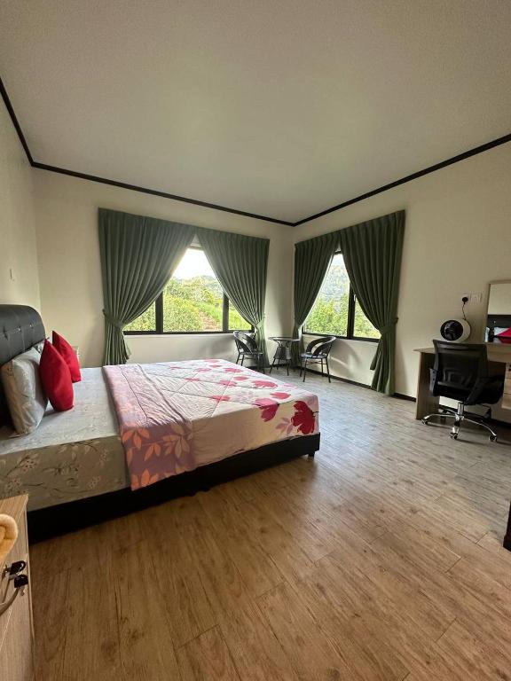 Postel nebo postele na pokoji v ubytování GEORGE ADVENTURE BASE BUNDU TUHAN