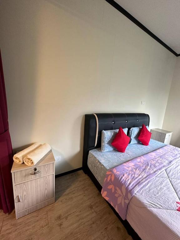Postel nebo postele na pokoji v ubytování GEORGE ADVENTURE BASE BUNDU TUHAN