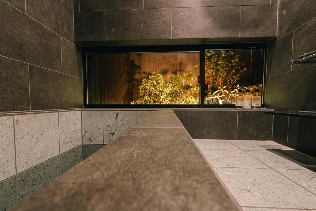 Koupelna v ubytování private your resort ITTEKURAi 松山