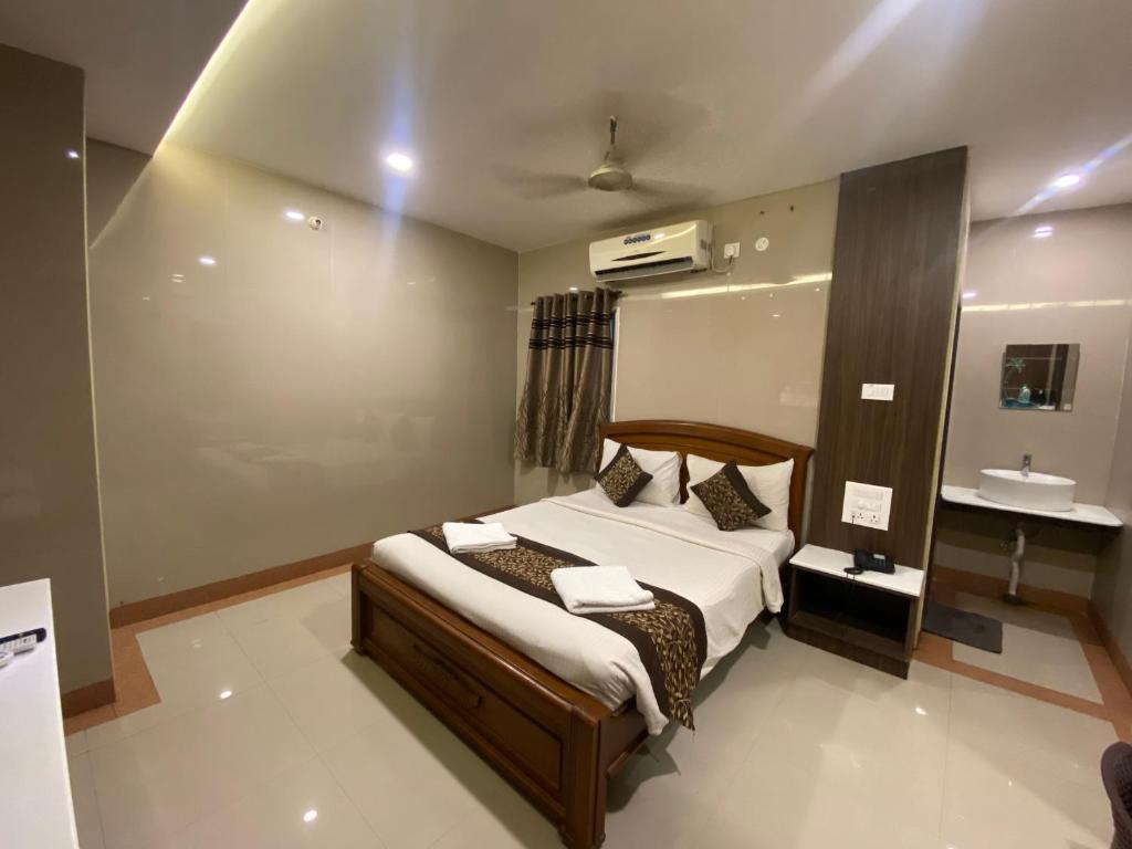 Postel nebo postele na pokoji v ubytování Hotel Sivas Regency