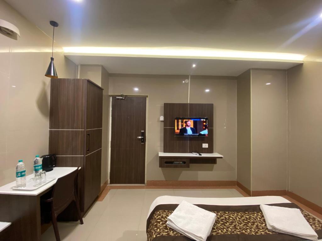 Postel nebo postele na pokoji v ubytování Hotel Sivas Regency