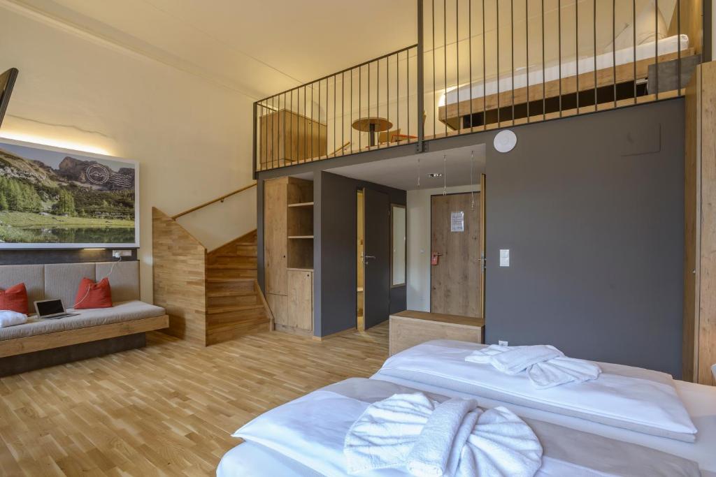 Postel nebo postele na pokoji v ubytování JUFA Hotel Spital am Pyhrn