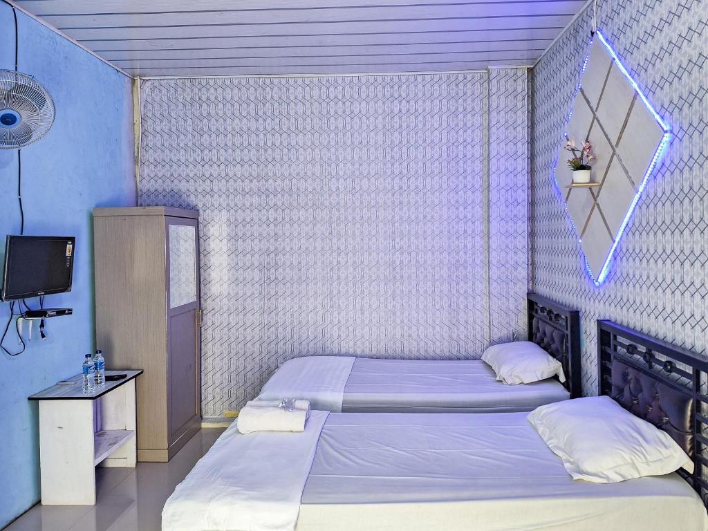 Homestay Sakinah Syariah Mitra RedDoorz - Standaard Twin Room