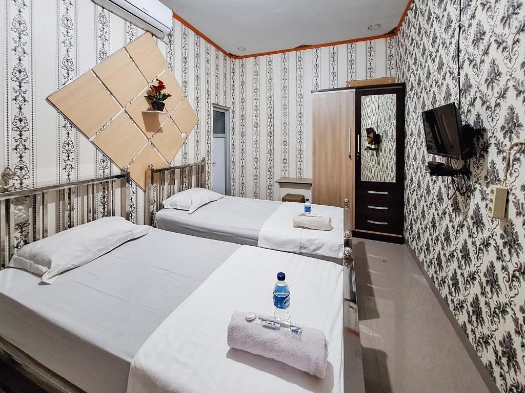 Homestay Sakinah Syariah Mitra RedDoorz - Luxe Tweelingzaal