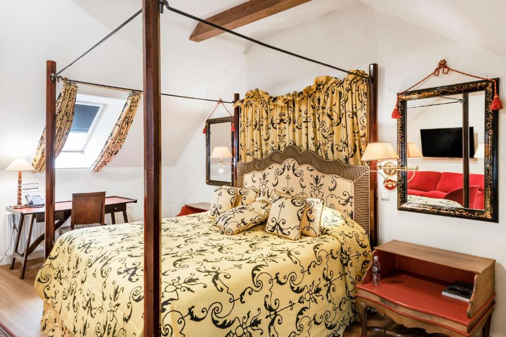 Postel nebo postele na pokoji v ubytování Stikliai Hotel - Relais & Châteaux