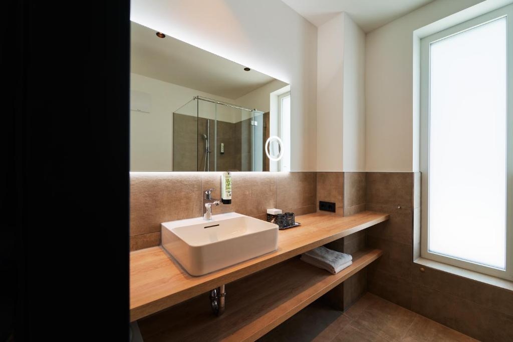 Koupelna v ubytování I'M INN Zwettl - Hotel zum Brauhaus