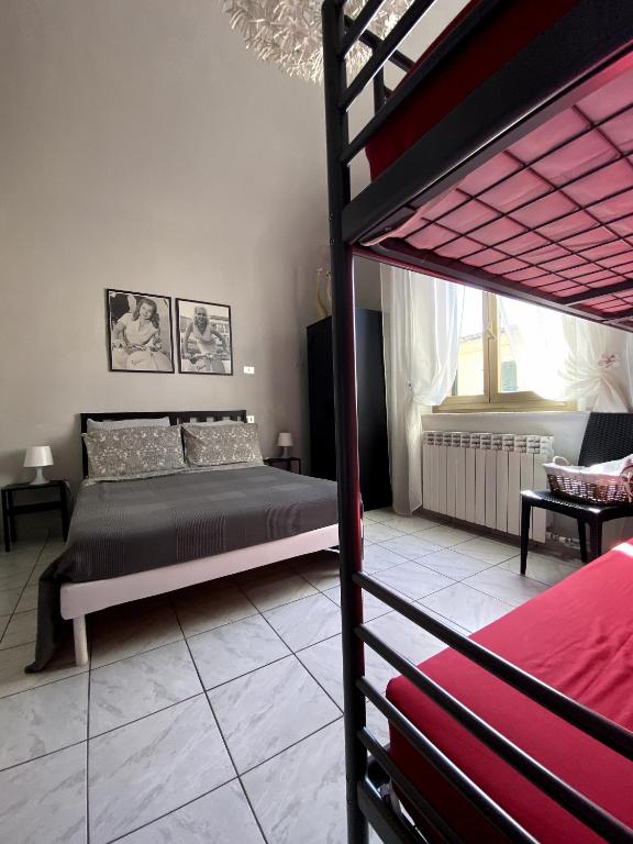 Postel nebo postele na pokoji v ubytování B&B Pontedera