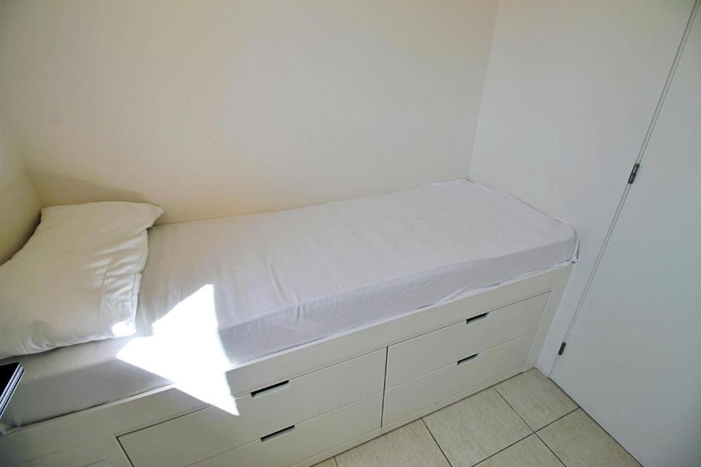 Postel nebo postele na pokoji v ubytování Villa Rosa