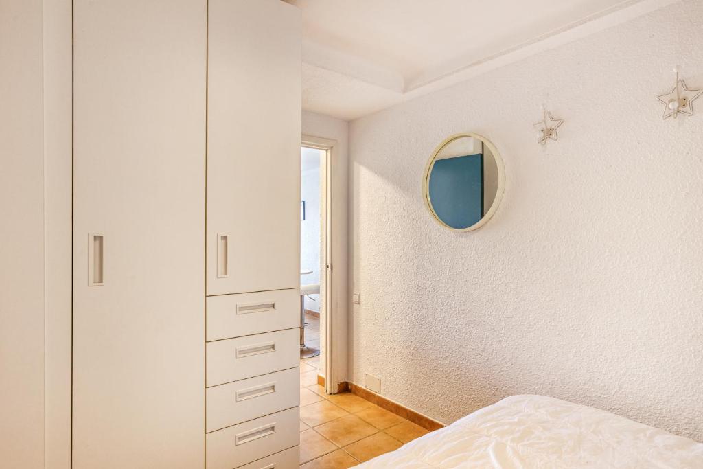 Postel nebo postele na pokoji v ubytování 1a Linea mar port Llafranch