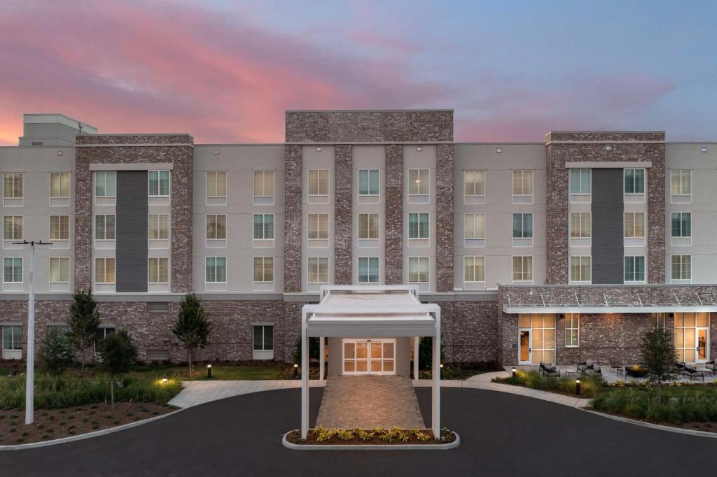 a rendering of the front of a building at Hilton Garden Inn Pensacola Downtown in Pensacola