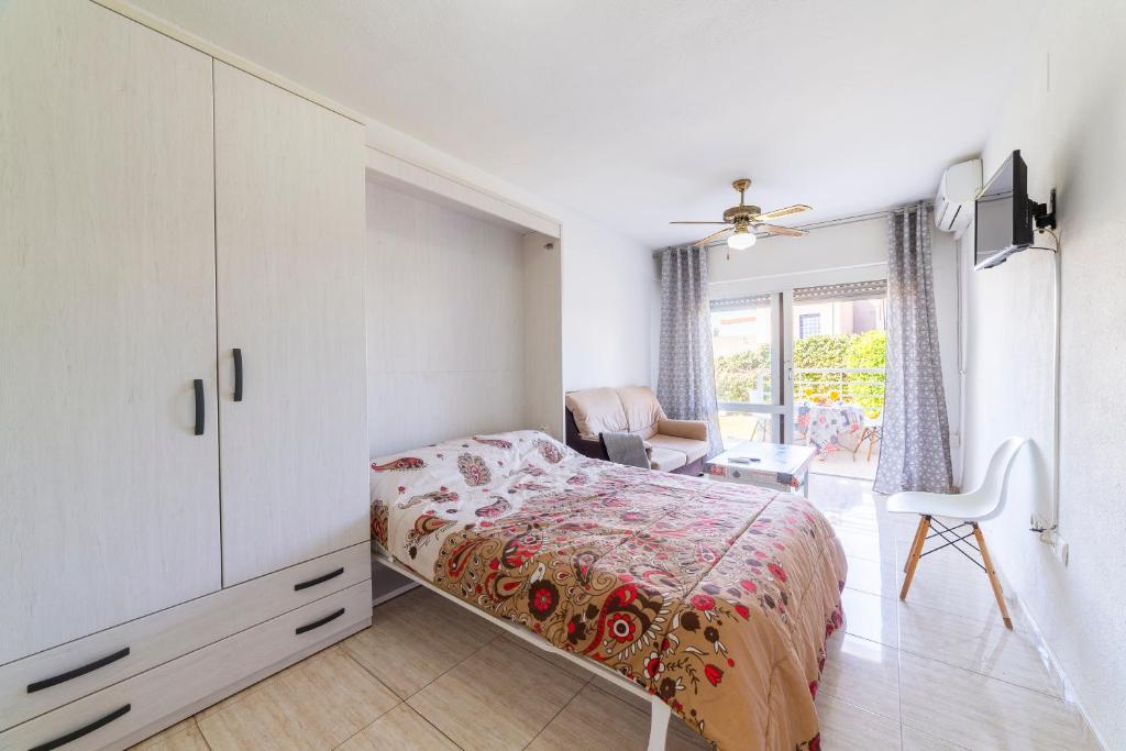 A bed or beds in a room at Gaviotas 4