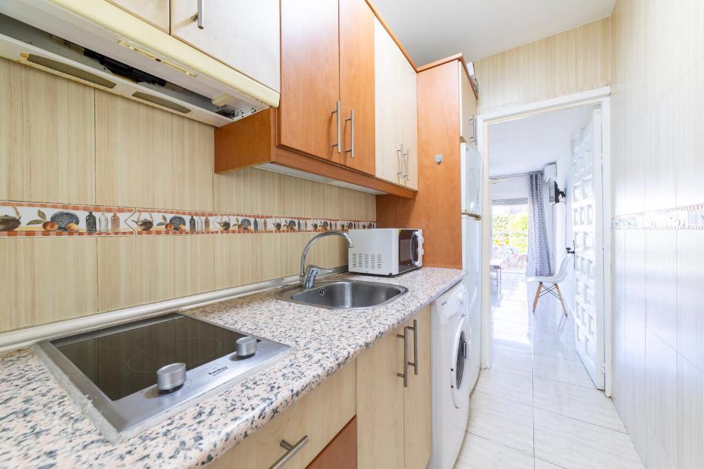 A kitchen or kitchenette at Gaviotas 4