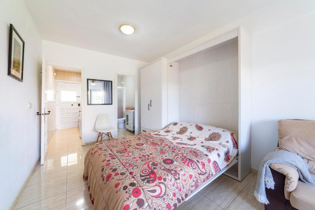 A bed or beds in a room at Gaviotas 4