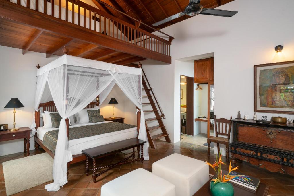 Postel nebo postele na pokoji v ubytování Taru Villas Kandy
