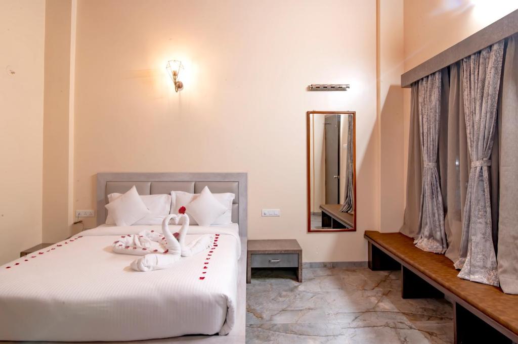 Postel nebo postele na pokoji v ubytování Freesia Resort by Express Inn