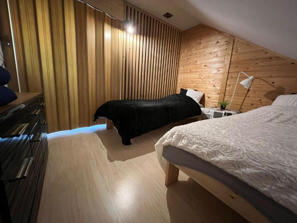 Posteľ alebo postele v izbe v ubytovaní Apartament 4 plus 1 w Karkonoszach