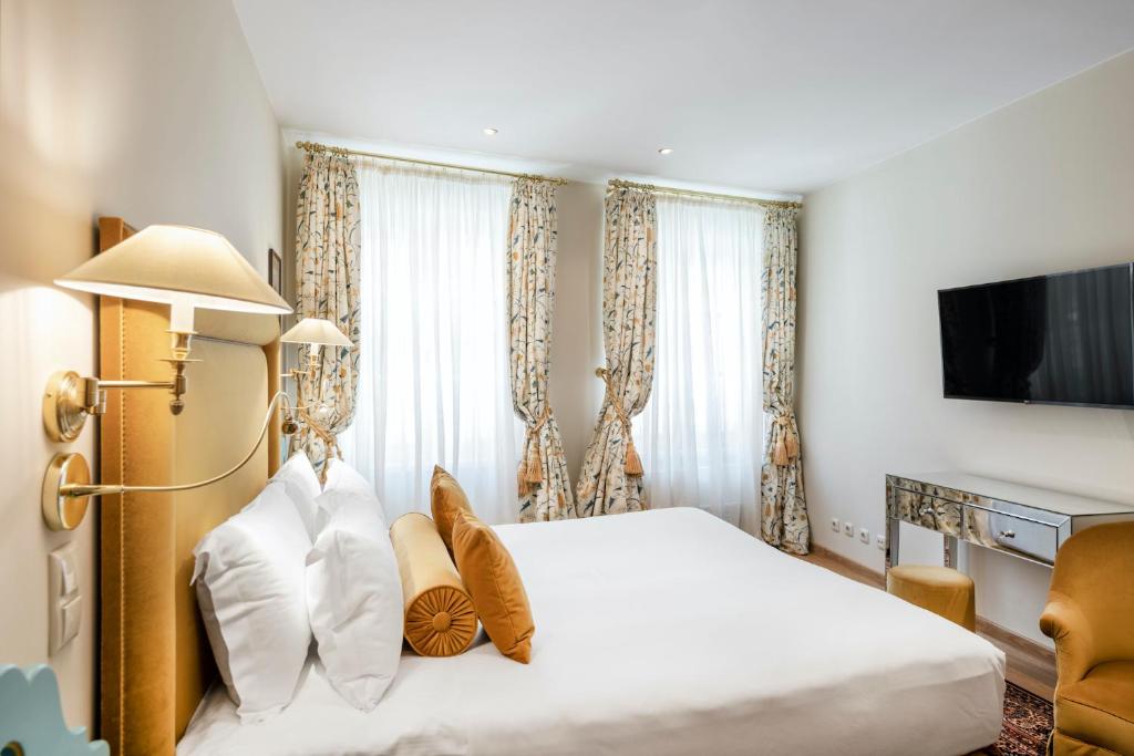 Postel nebo postele na pokoji v ubytování Stikliai Hotel - Relais & Châteaux