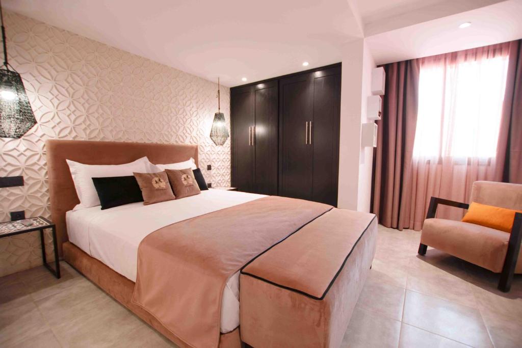Postel nebo postele na pokoji v ubytování Riad La Petite Majorelle