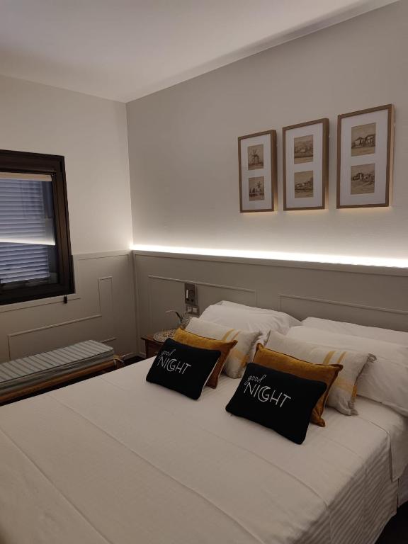 Postel nebo postele na pokoji v ubytování VILLA DREAMS - VILLAS LA ESTANCIA -
