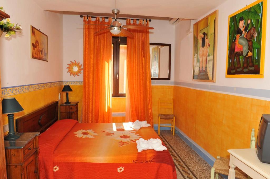 Posteľ alebo postele v izbe v ubytovaní B&B Tony and Judy