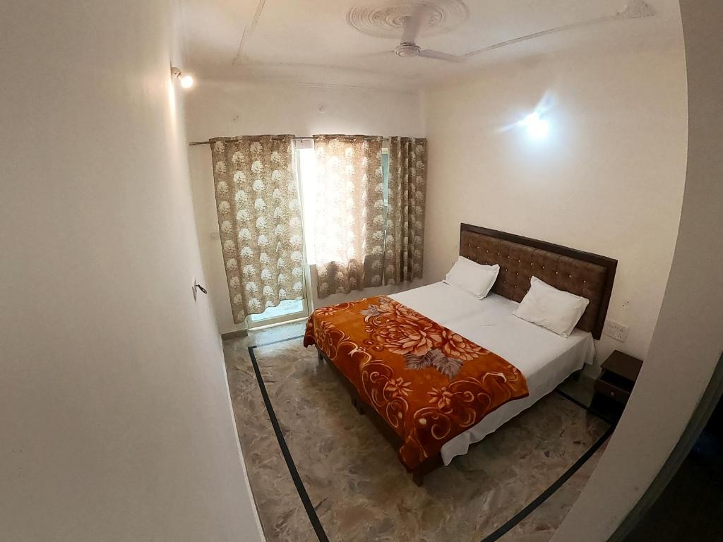 Postel nebo postele na pokoji v ubytování Karma Hostel