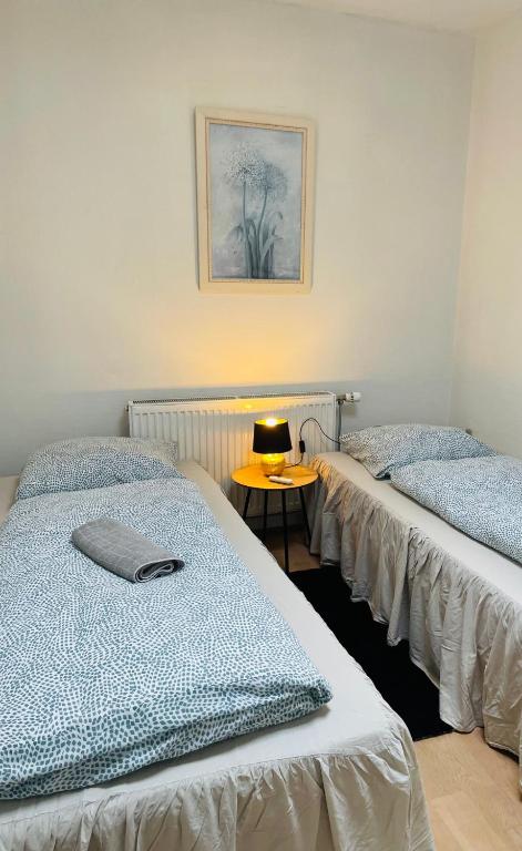 Postel nebo postele na pokoji v ubytování Padborg Hotel