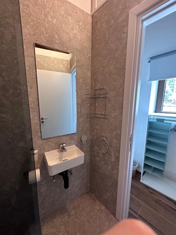 Koupelna v ubytování Kallithea INN