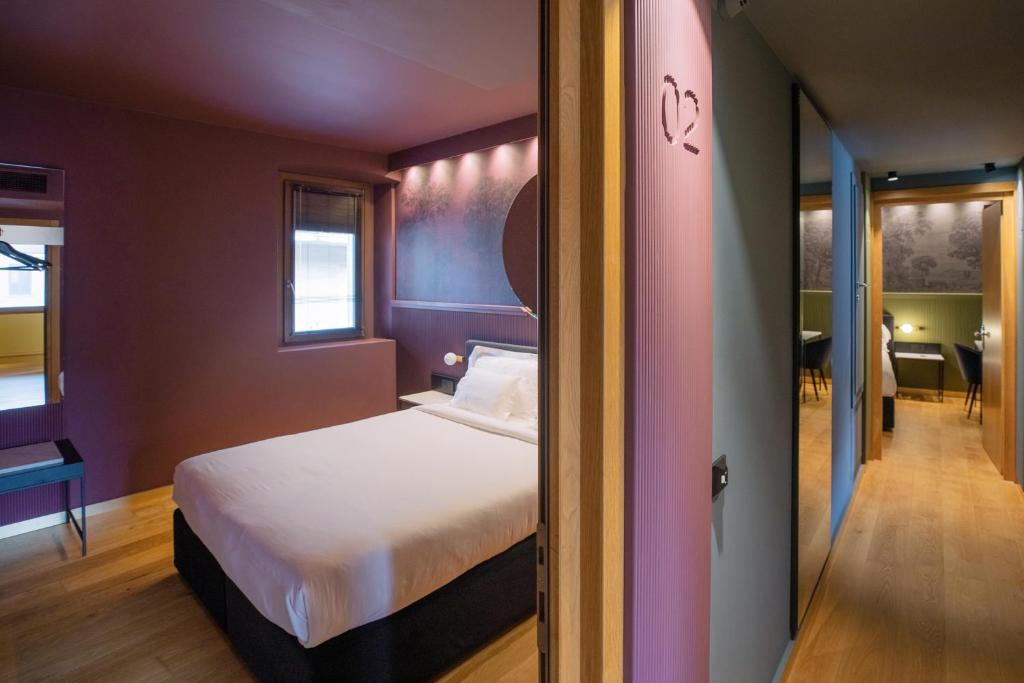 Postel nebo postele na pokoji v ubytování Albergo La Braseria