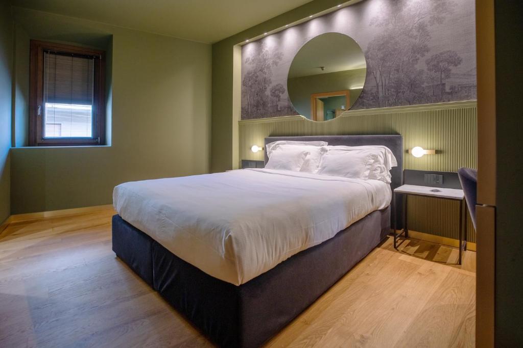 Postel nebo postele na pokoji v ubytování Albergo La Braseria