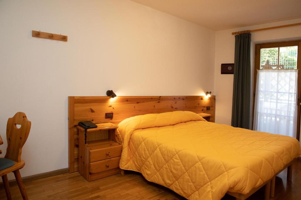 Postel nebo postele na pokoji v ubytování Garni Manuela
