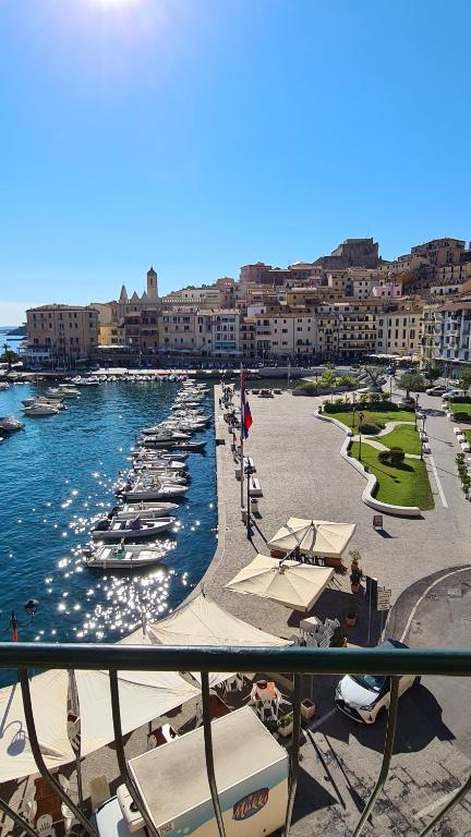 a view of a harbor with boats in the water at Attico vista mare mozzafiato in Porto Santo Stefano