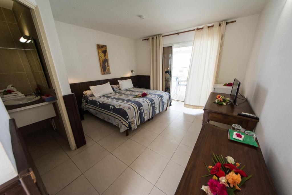 Postel nebo postele na pokoji v ubytování Coco Beach Marie-Galante
