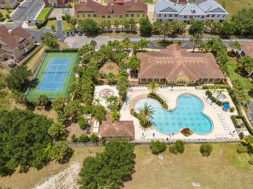 an aerial view of a home with a swimming pool at A hidden Gem in plain sight in Orlando