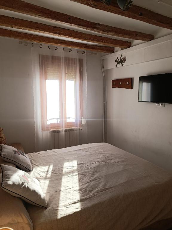 Postel nebo postele na pokoji v ubytování Apartament Turístic Campdevànol
