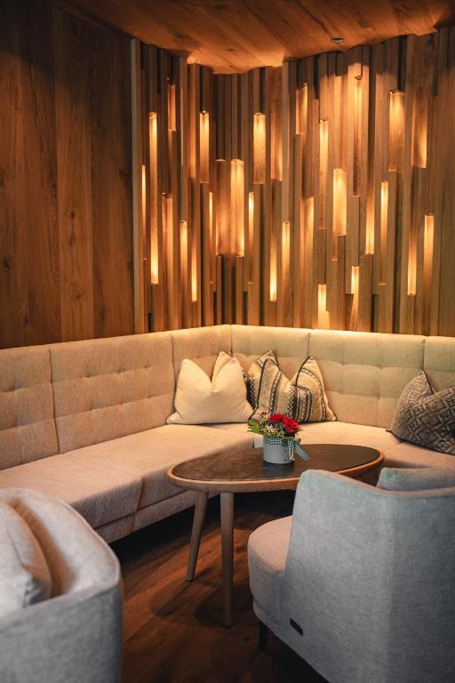 A seating area at Residence Chalet L'Salvan