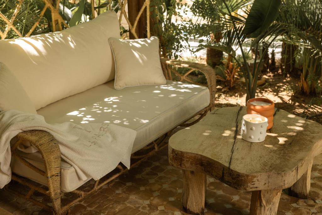 Posezení v ubytování Les Palmiers Boutique Hôtel & Spa