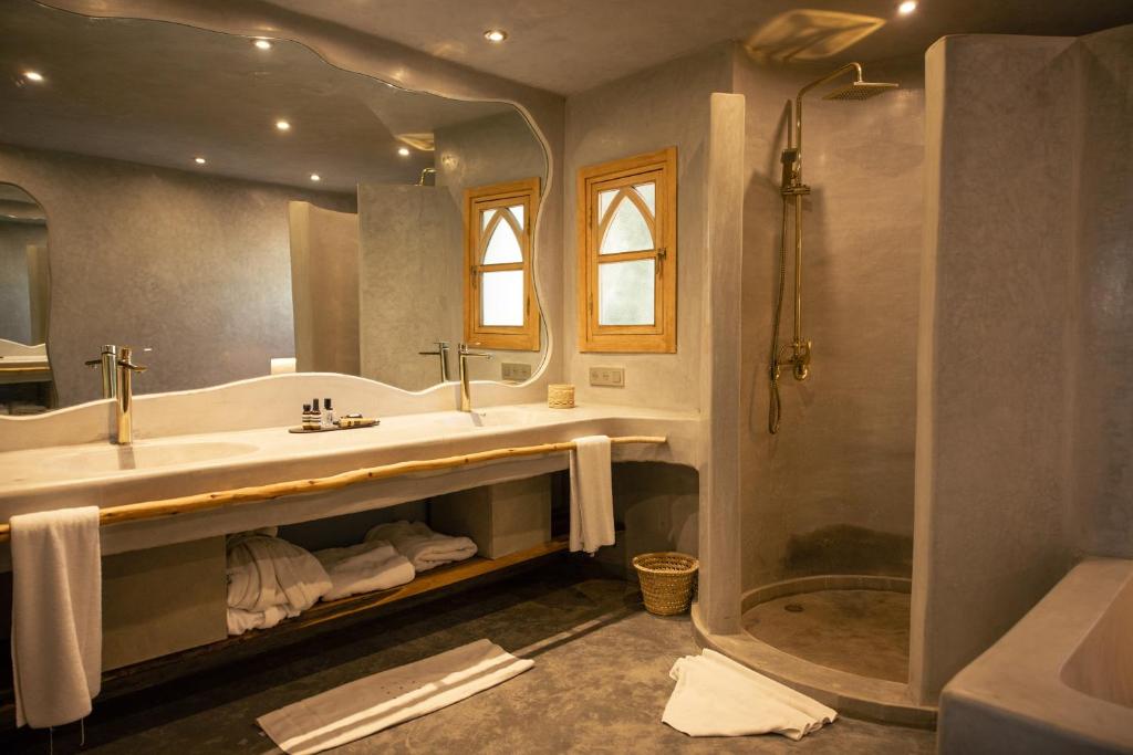 Koupelna v ubytování Les Palmiers Boutique Hôtel & Spa