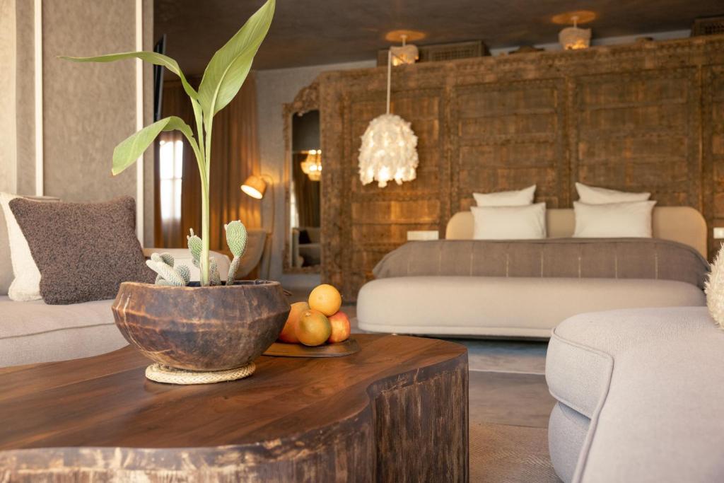 Posezení v ubytování Les Palmiers Boutique Hôtel & Spa